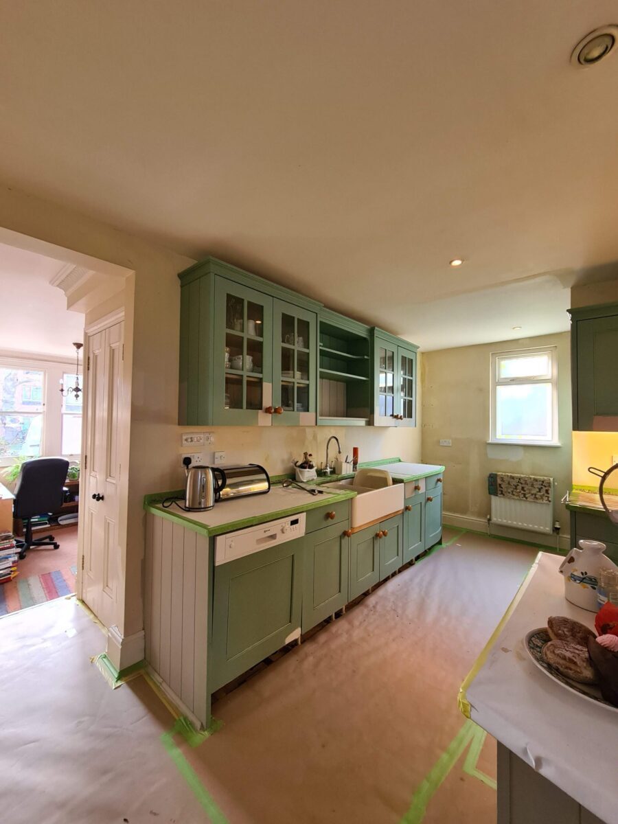 Spray and hand-painted kitchen in Kew