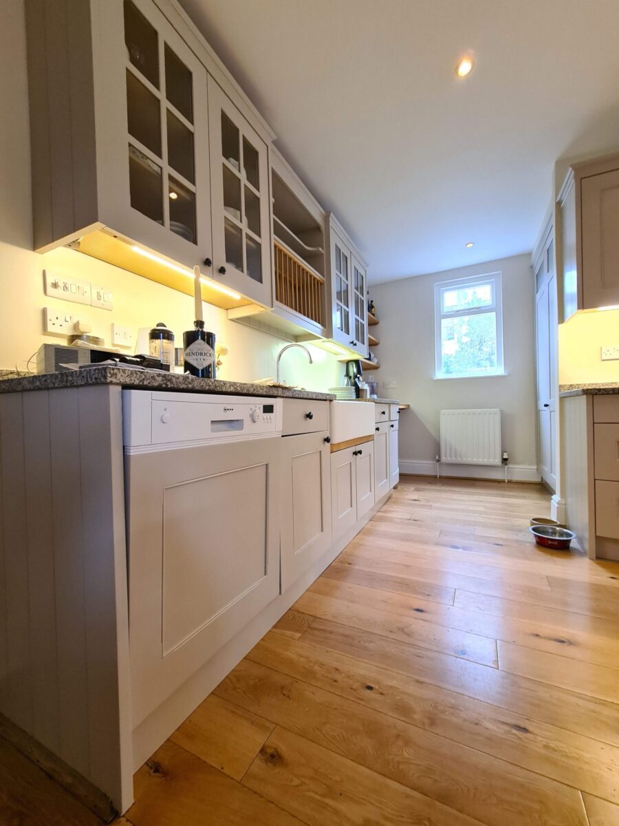 Spray and hand-painted kitchen in Kew