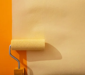 Can I paint over wallpaper